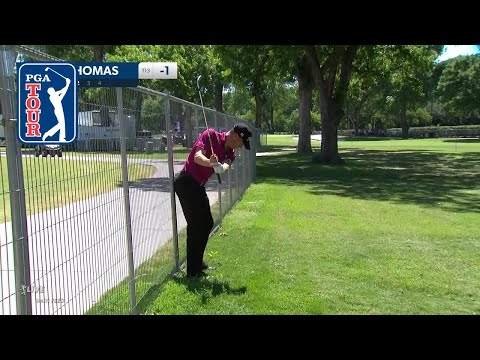 Justin Thomas salvages par at the fence
